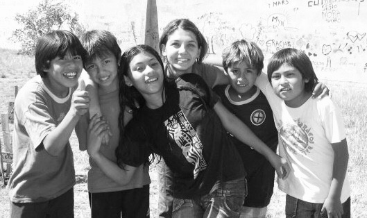 Instructor's image with Qom Indigenous school children in Argentina