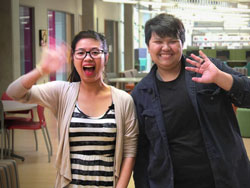 Students waving at the camera