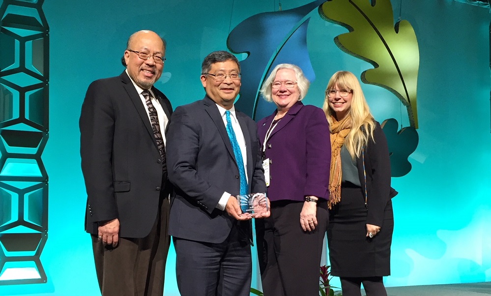 Sustainability staff and President Mitsui receiving Climate Leadership Award