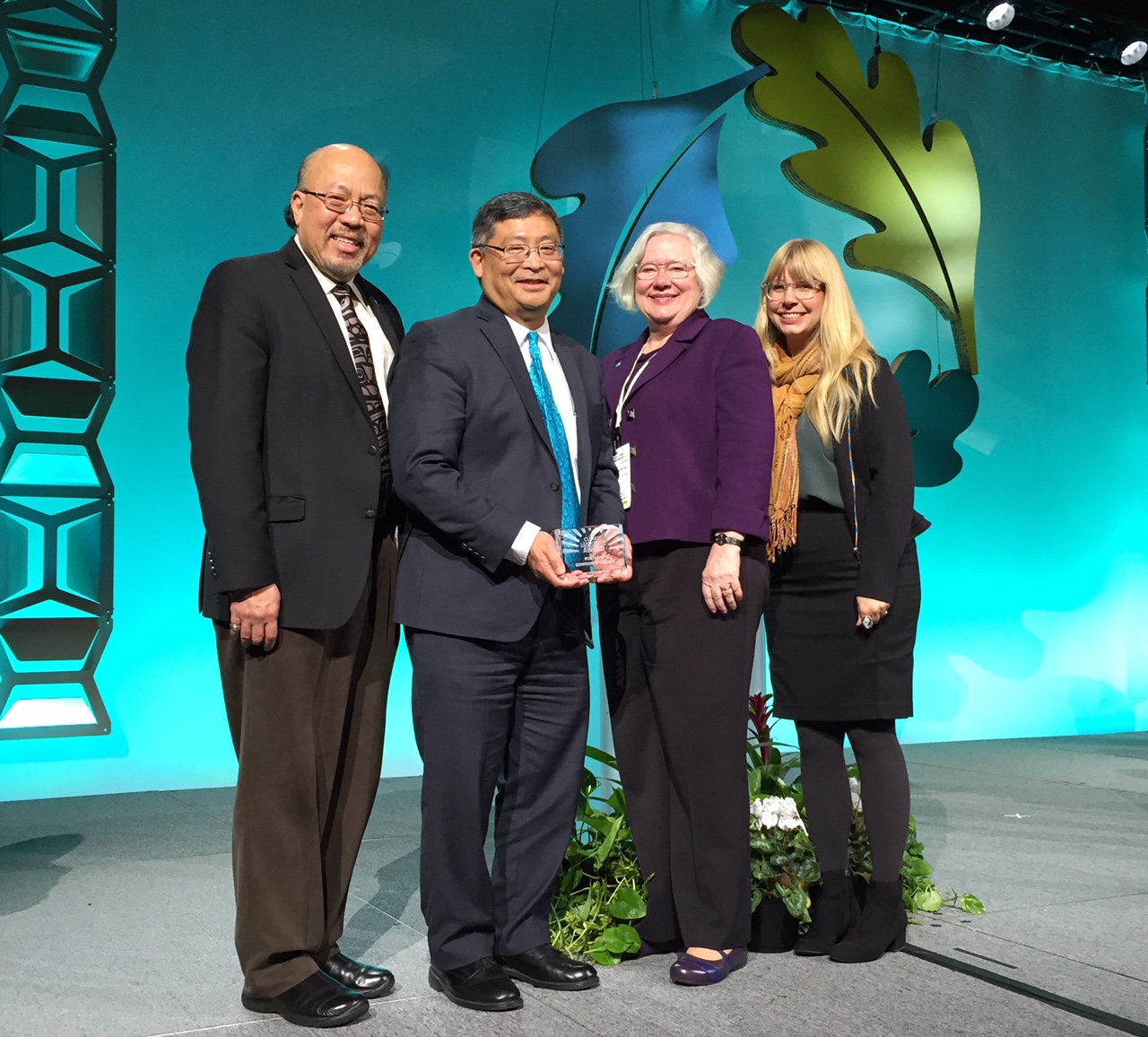 Sustainability staff and President Mitsui receiving Climate Leadership Award