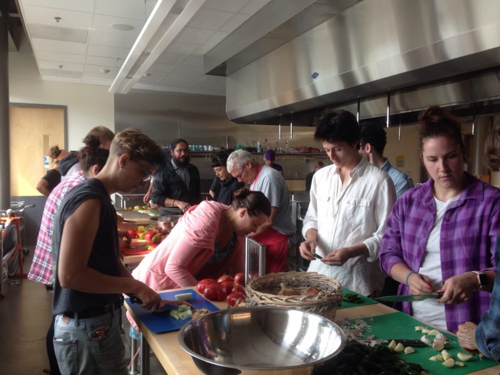 Students from Permaculture Design class making salsa with garden ingredients in the Food and Nutrition Lab in Bldg 5.