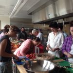 Students from Permaculture Design class making salsa with garden ingredients in the Food and Nutrition Lab in Bldg 5.