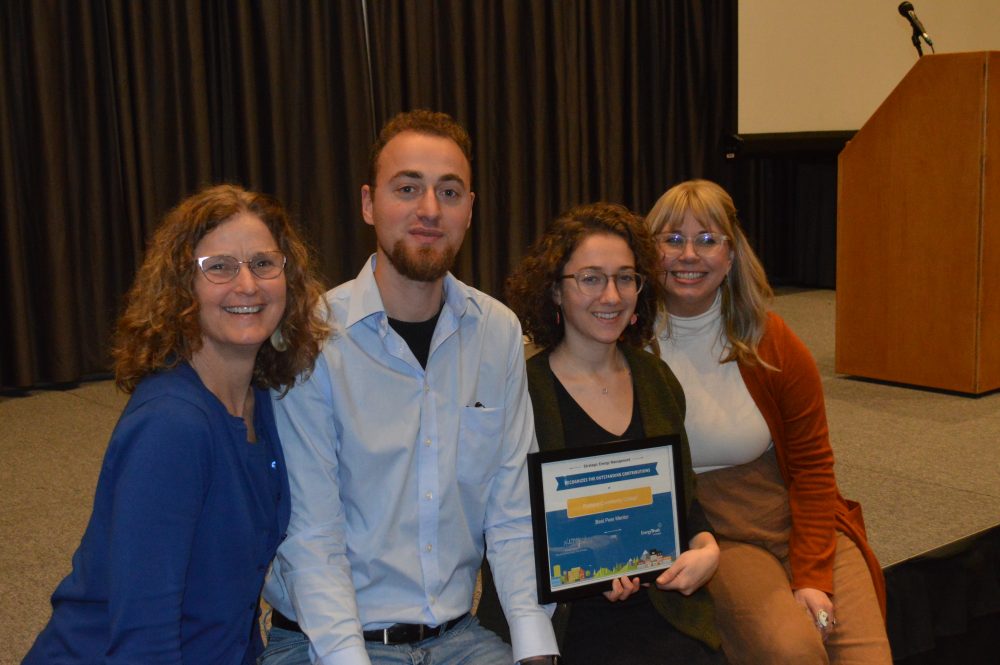 Sustainability Team members celebrate an award from the Energy Trust of Oregon