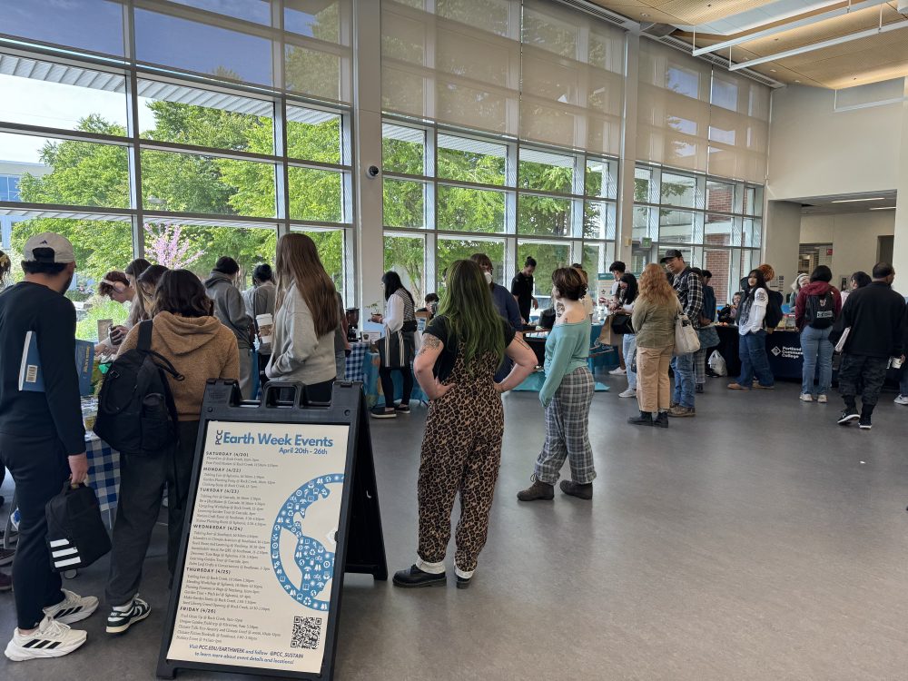Earth Week Tabling Fair with many folks visiting the tables