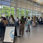 Earth Week Tabling Fair with many folks visiting the tables