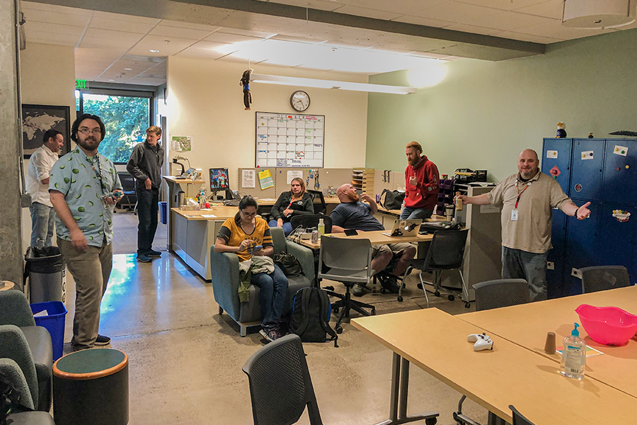 SY VRC interior with lockers, hangout area, computers, and smiling staff