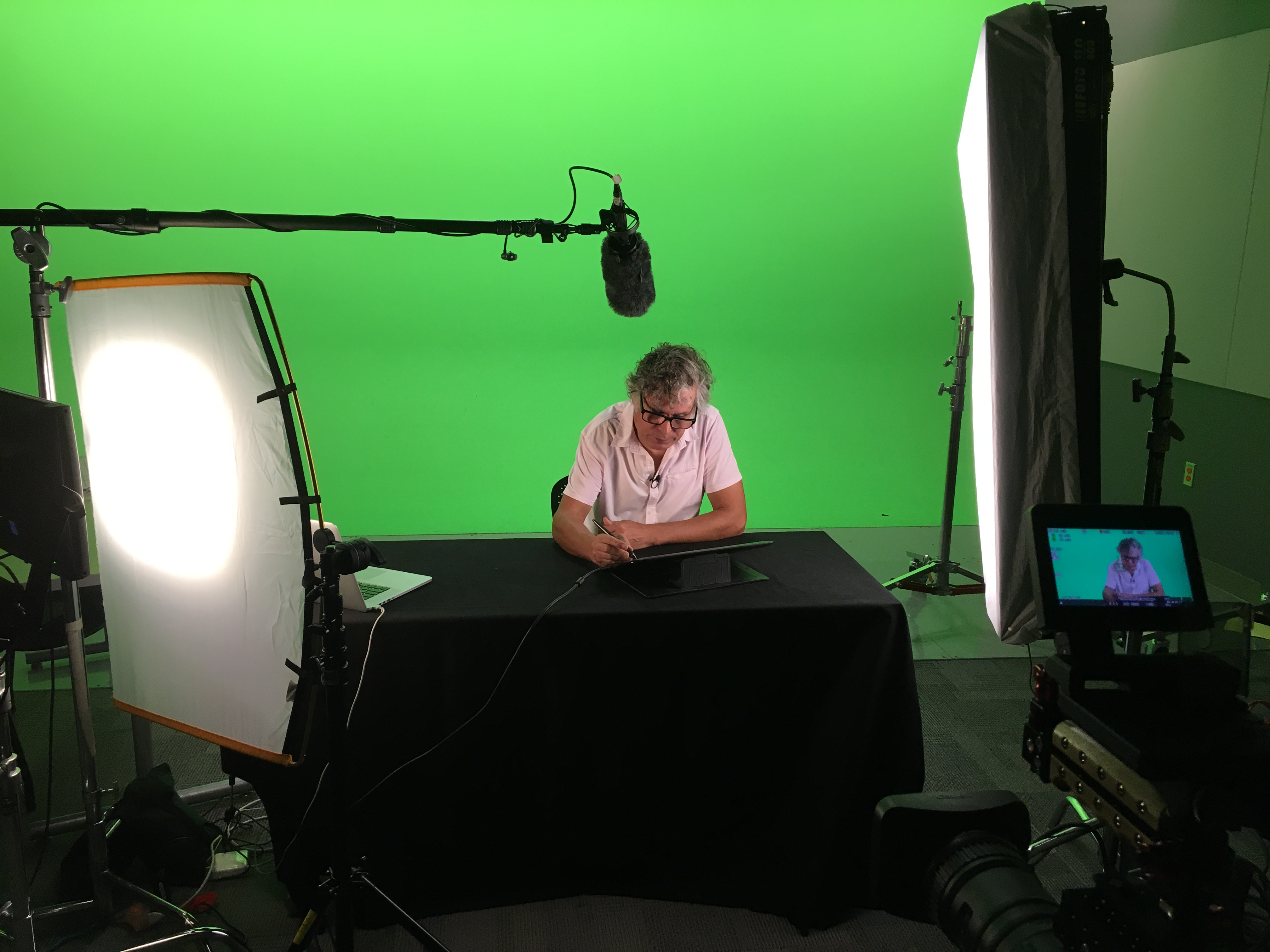 Instructor Bryan Hull seated at a table