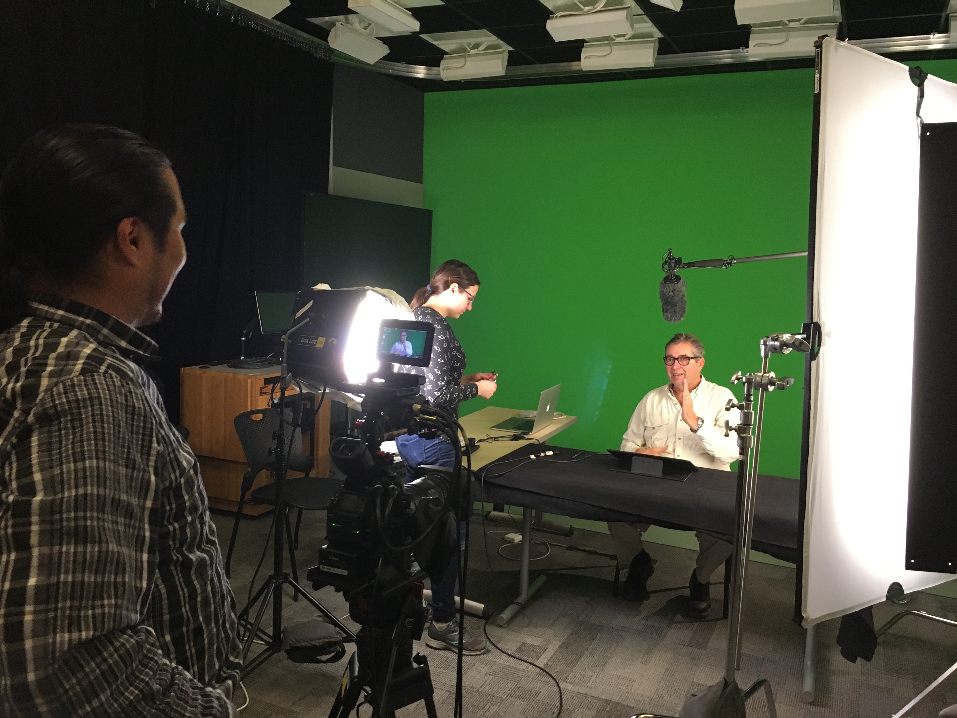 Instructor Toby Dittrich seated at a table