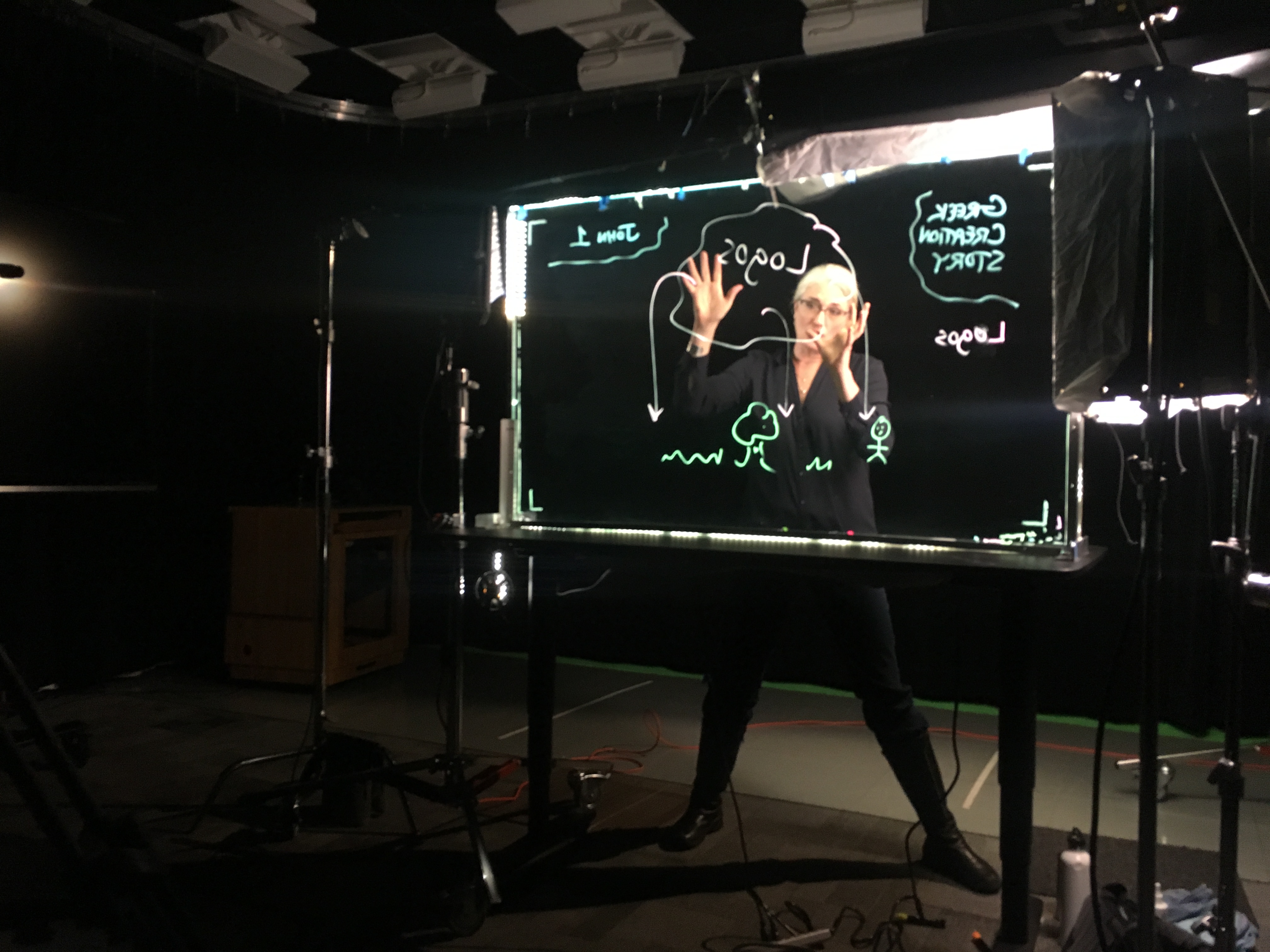Jennifer Bird standing behind the Learning Glass set-up