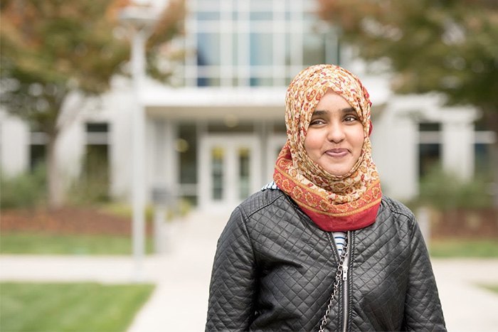 Portrait of a woman - she is in focus and the background is blurry