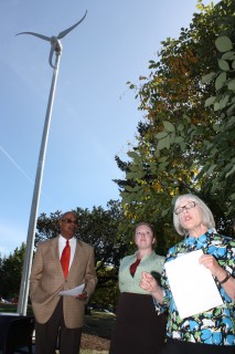 Linda Gerber, Sylvania Campus President, Erin Sanforth, sustainability coordinator, and President Preston Pulliams talk about the PCC Climate Action Plan under the new wind turbine.