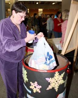 A Sylvania staffer has plenty of food to donate.