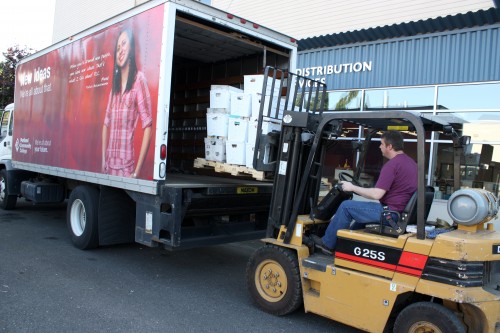 Central Distribution loads boxes of donated books destined for the Coffee Creek Correctional Facility in Wilsonville.