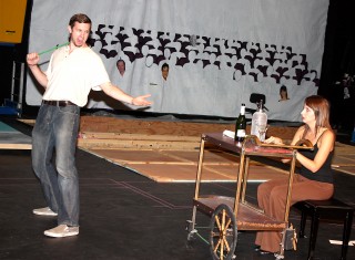 A scene from PCC's fall play, 'Footlight Frenzy.' Characters Alex Malone (played by Joel Montgomery) and Laura Becker (Kaija Rayne) are entangled in a mess of a production to save a school, spurred on by an overzealous PTA.