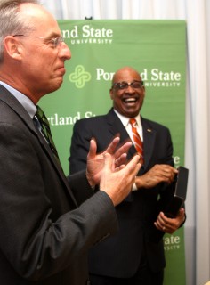 dual9 After exchanging gifts, the two presidents share a light moment after the signing. The gifts included a PCC organizers for President Wiewel and a PSU tie for President Pulliams.