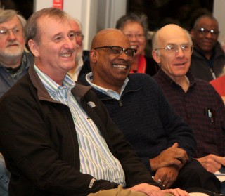 Left to right, PCC Board member Gene Pitts and District President Preston Pulliams enjoy the town hall at the Southeast Center.