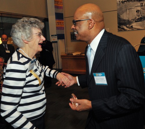 Betty Kendall, retired automotive instructor and the first certified female automotive service instructor in the nation, gets her Diamond Alum Award from PCC District President Preston Pulliams.