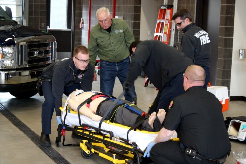 Paramedics with Hillsboro Fire demonstrate an emergency scenario with one of the high-tech mannequins purchased by PCC.