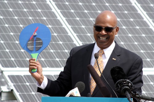 PCC District President Preston Pulliams holds up a solar-powered paddle fan, a gift given to invited guests at the solar array unveiling on Friday, May 18 at the Rock Creek Campus