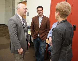 Brad Avakian (left) visits with PCC staff at Willow Creek in May.