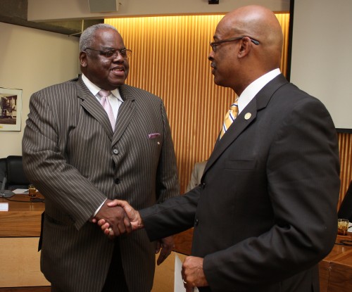 Harold Williams, left, is congratulated by PCC President Preston Pulliams on Williams’ winning the Pacific Region Trustee Leadership Award in 2010