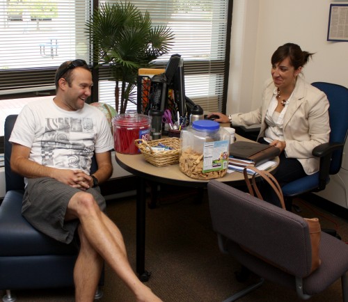 Zach Schooner, pictured with Rock Creek Veterans Resource Center Specialist Elizabeth Bergstad, likes the casual atmosphere of the resource center, where veterans say they feel comfortable.