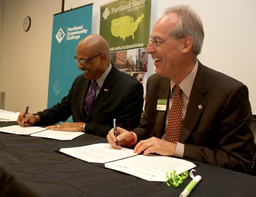 Right to left, PSU President Wim Wiewel and PCC President Preston Pulliams officially sign the agreement