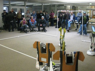 A large crowd gathers to witness Sylvania’s first remotely-controlled robot soccer tournament.
