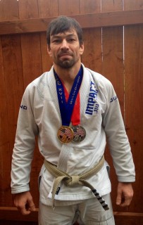 Richard Rangel, a part-time instructor in Sylvania’s physical education department, proudly displays his gold and silver medals from the recent Brazilian Jiu-Jitsu U.S. Open tournament. In addition to teaching mixed martial arts at the college, he travels throughout the world to compete in Jiu-Jitsu competitions.