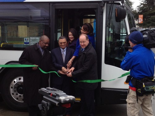 TriMet unveiled its new diesel-electric hybrid buses with a ribbon-cutting ceremony at Cascade on Jan. 30. The new buses will run on the No. 72 line, which services both the Cascade and Southeast campuses, and is one of TriMet's most-used routes. Pictured from left are TriMet board member Dr. T. Allen Bethel, Cascade Campus President Algie Gatewood, Latino Network Executive Director Carmen Rubio, Multnomah County Commissioner Loretta Smith, and TriMet General Manager Neil McFarlane.