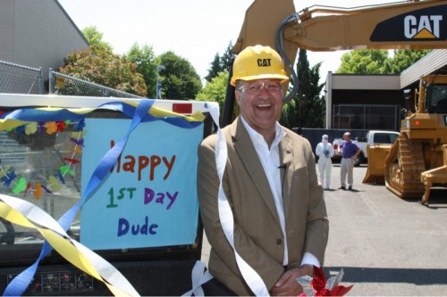 Since it is President Brown's first day, he has been inundated with lots of gifts at each campus and center. He is even getting welcoming signs on golf carts, which guided his shuttle onto the Rock Creek Campus.