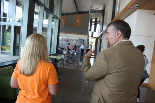 Karen Jones gives Brown a tour of the sustainability features of Newberg Center. After some refreshments and a meet-and-greet with students and staff, he is on his way to Hillsboro Center.