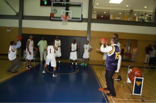 Jeremy and Algie Gatewood go head-to-head in a free throw contest at the Cascade gym. Who won? Let's just say the college president had the edge.