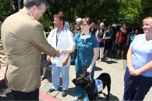Jeremy Brown takes some time to meet students and staff at Rock Creek. This included staffers of the canine kind, too.