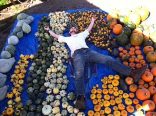 PCC's AmeriCorps team member Jeffery Mailes shows just the fun one can have with gourds and pumpkins.