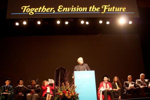 Oregon Governor John Kitzhaber speaks to the crowd of 500 people at the Portland Art Museum.