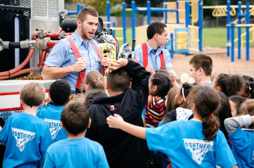 Students Mitch Thornburg and Robert Williams "show and tell" about the fire truck they use for training exercises at PCC. 