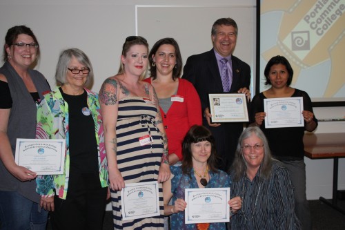 President Jeremy Brown joins 2014 Gerontology Program graduates, staff and faculty at the annual completion ceremony.