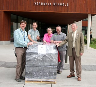 The group that worked together to secure the computers included, left to right, Aaron Miller (Vernonia Elementary School principal), Bill Langmaid (Vernonia School Board Chair), Leslie Riester (associate vice president of Technology Solution Services), Craig Londraville (Rock Creek's technology services manager) and Ken Cox (Vernonia Schools superintendent).