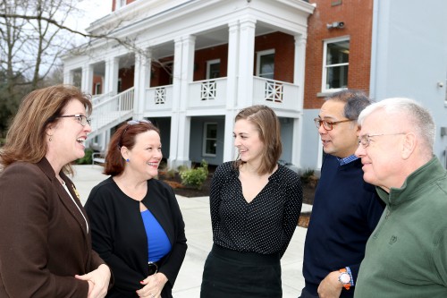 Left to right, in front of the Administration Building is Southeast Campus President Jessica Howard, Director of the PCC Small Business Development Center and International Trade Center Tammy Marquez-Oldham, CLIMB Center Program Manager Kristen Mozian, SBDC Advisor Andrew Adeboi and Client Services Liaison Roger Huges. Not Pictured: Business Advisor Jarvez Hall.