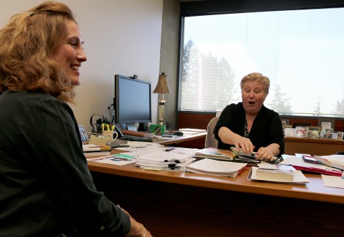 Chris Chairsell (right), vice president of academic & student affairs, shares a light moment with Kate Chester, PCC's Public Relations manager, as they discuss the college's accreditation report.