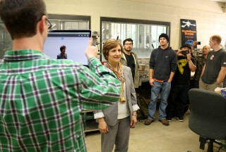 Congresswoman Suzanne Bonamici is scanned by Ben Hill at the MakerSpace for a 3D modeling.