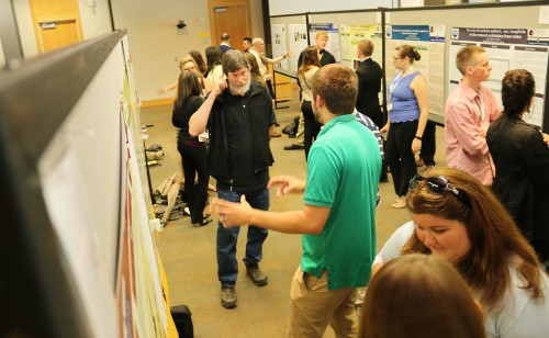 Attendees, which included staff and faculty from PCC and elsewhere, got a chance to view poster summaries of the research projects and chat with the students about their findings.