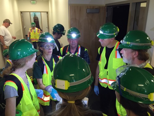 C-CERT team members huddle up during the recent earthquake simulation at Cascade.