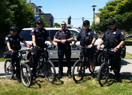 The Cascade bike team (from left): Officer Wally Chow, Officer Steve Feather, Sgt. Erik Hargrove, Officer Lyle Brown, and Officer Tony Whitmore.
