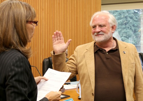 Michael Sonnleitner is sworn into service by Interim PCC President Sylvia Kelley in July. He has an extensive history of service not only at the college but within the community.