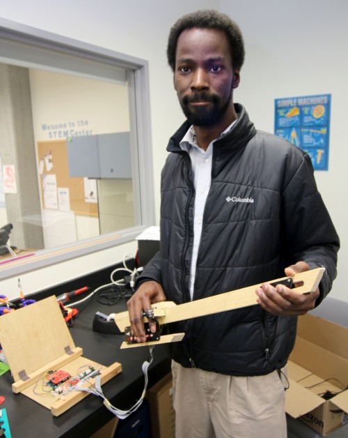 In the STEM Center, he has a digital guitar he created from wood and panels of, wires, microprocessors and buttons that create sound.