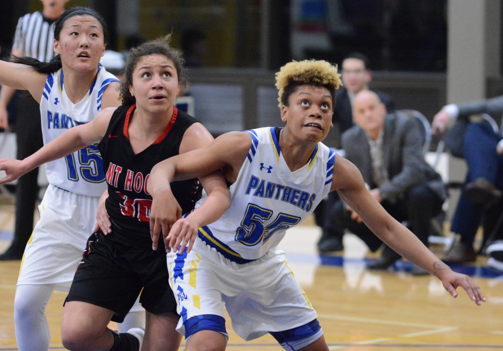 PCC guard Marchae Fesser artfully blocks out for a rebound during her team's 57-47 win over Mt. Hood.