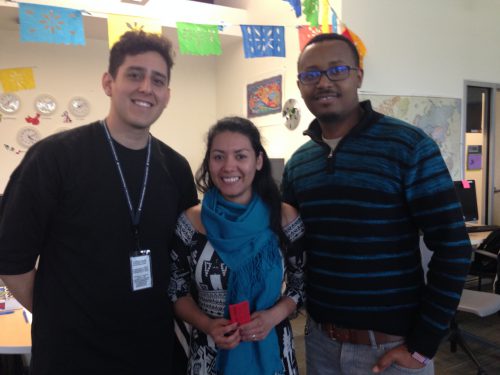 Computer science student George Gituri (right) says he's a regular visitor at Rock Creek's Multicultural Resource Center. He attended the center's recent open house along with assistant coordinator Eder Mondragón Quiroz (left) and Claudia Reinozo, coordinator of the Oregon Leadership Institute.
