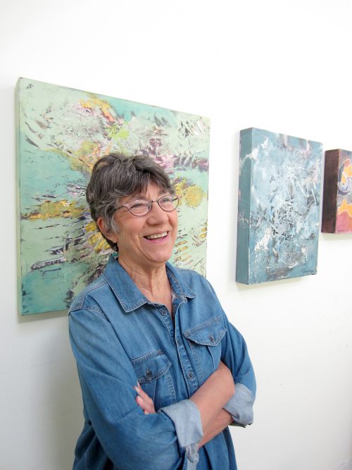 Mardy Widman in front of her painting titled ‘Elysian.’ Photograph by Jens Jensen.